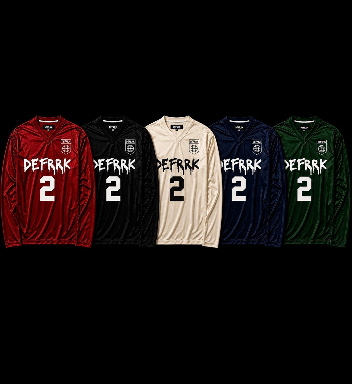 Five long-sleeve athletic jerseys displayed side by side on a black background, each with the word 'DEFRAK' and the number '2' printed on the front. The jerseys come in red, black, cream, navy, and green colorways.